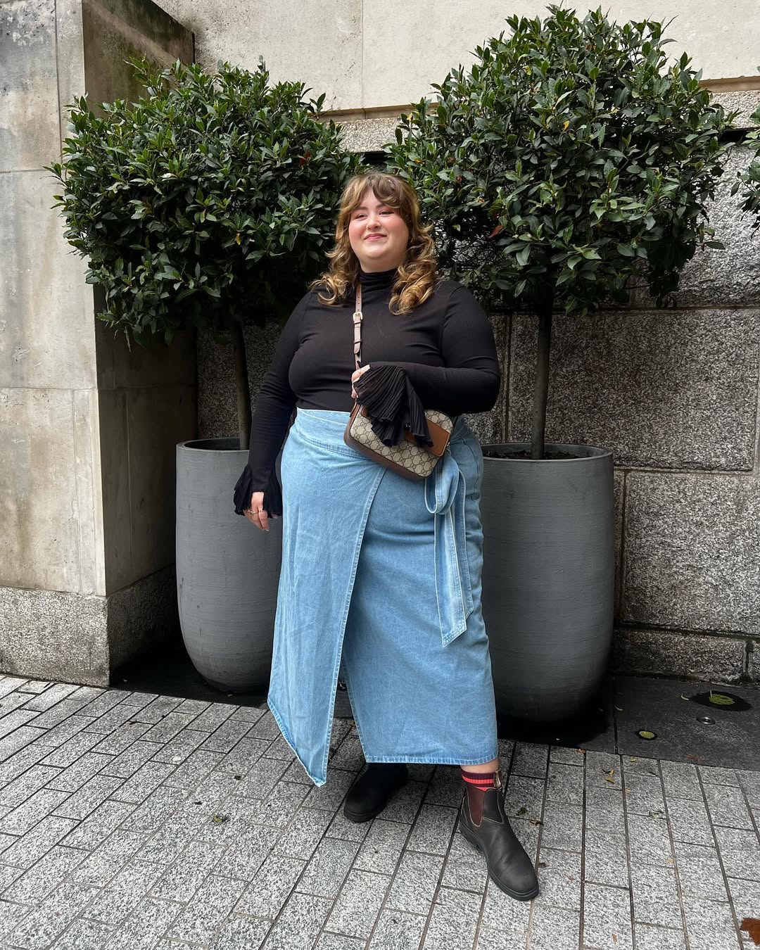 Black Mock-Neck Knit + Wrap-Denim Midi Skirt